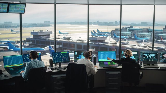 What does an air traffic controller do?