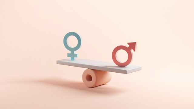 símbolos masculino y femenino sobre una balanza